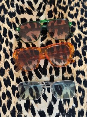 Colorful sunglass lot, green orange blue